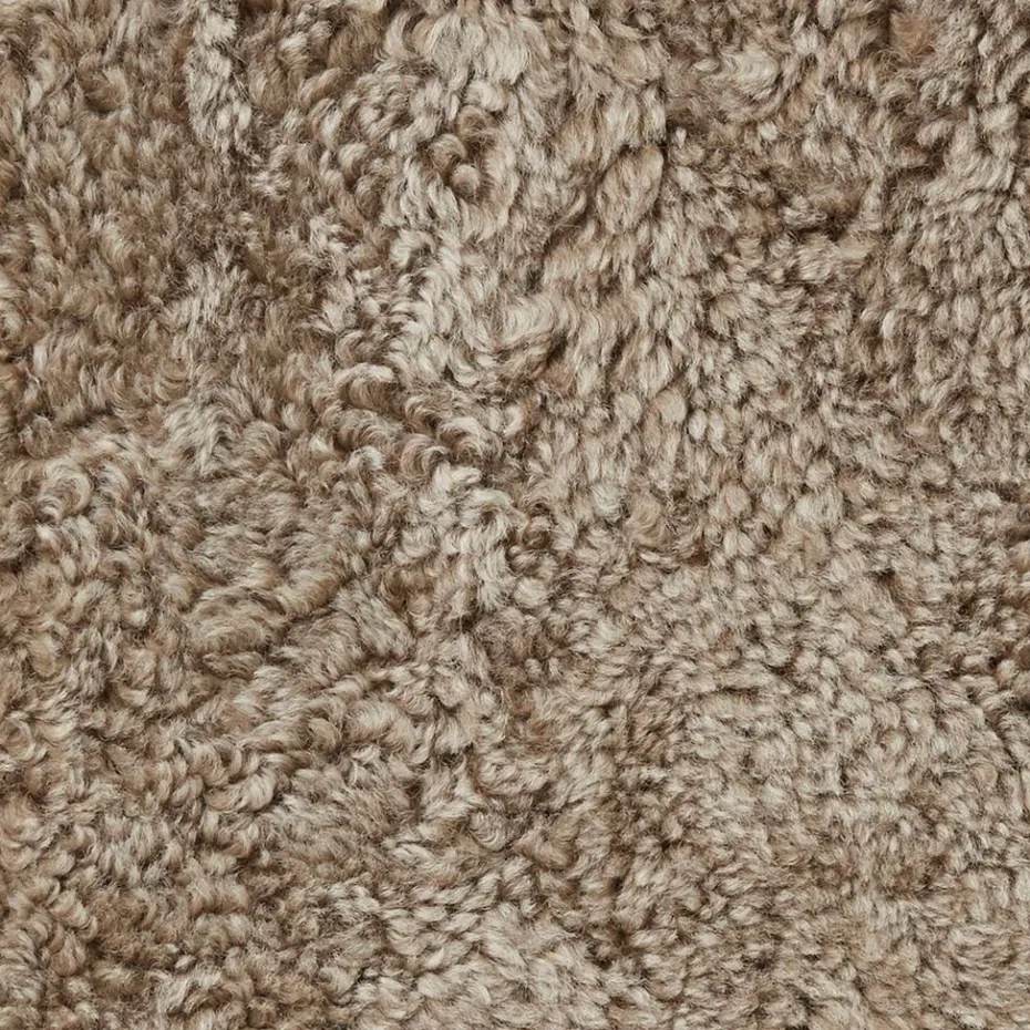 Skinnwille Saueskinnspute Round Curly 4-pakning